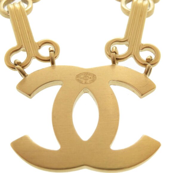CHANEL Gold Logo Brooch